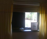 Magic Blackout Blind on left hand window